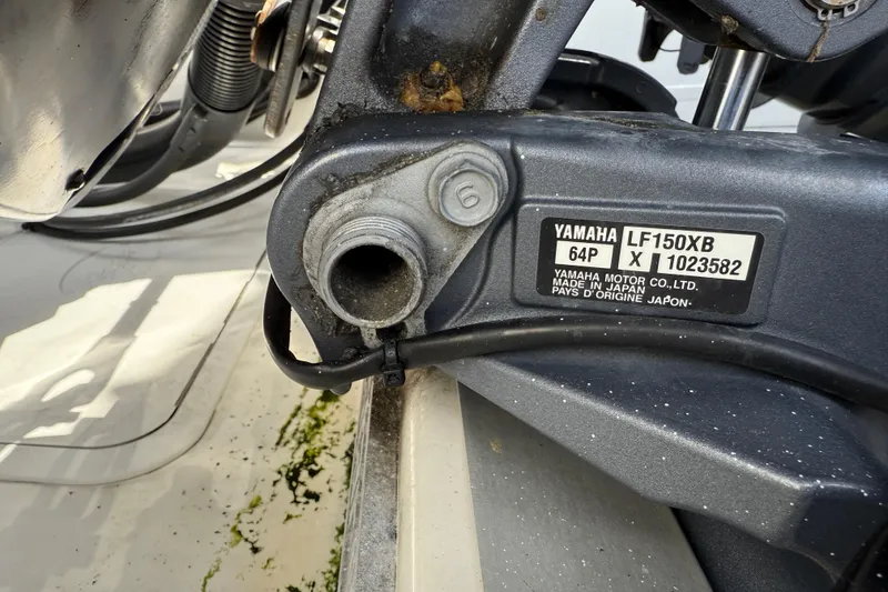 Slide: The Image of Close-up of Yamaha LF150X motor part on 2020 NauticStar 2602 Legacy boat. - 11