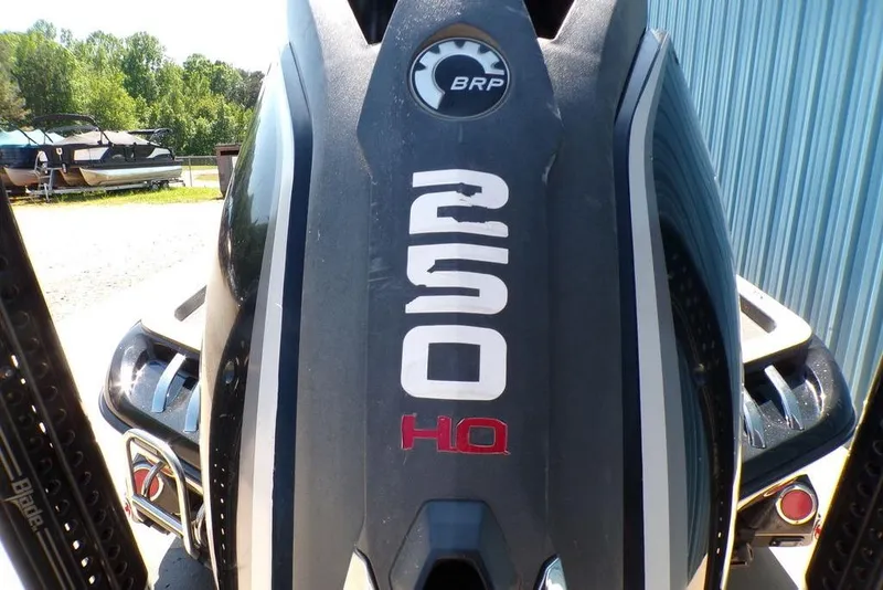 Slide: The Image of 2016 Ranger Z520 Comanche boat with BRP engine, parked outdoors. - 10