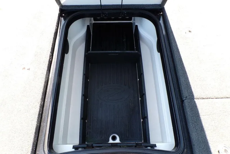 Slide: The Image of Open storage compartment of 2016 Ranger Z520 Comanche boat. - 14