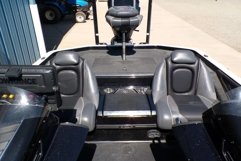 Slide: The Image of 2016 Ranger Z520 Comanche boat interior with dual seats and fishing equipment. - 22