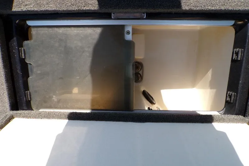 Slide: The Image of Storage compartment of 2016 Ranger Z520 Comanche boat, open and empty. - 23