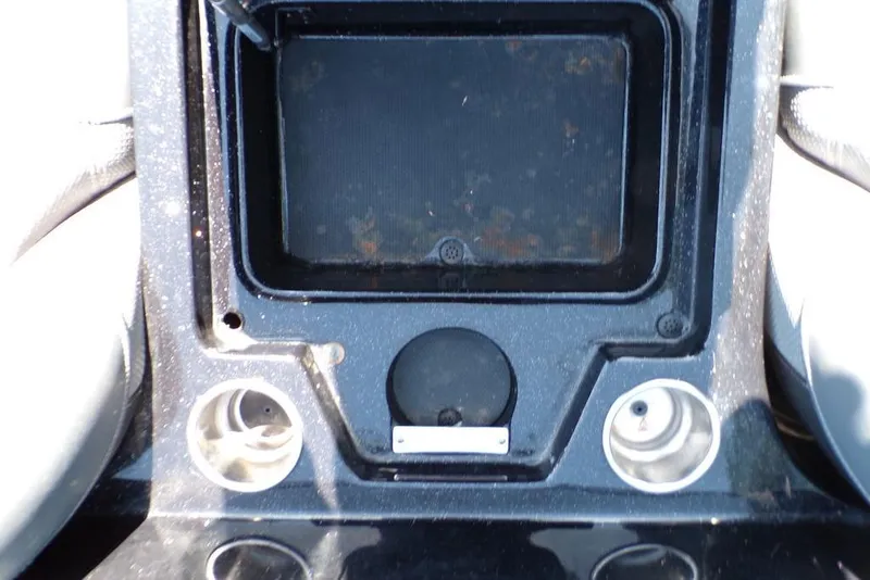 Slide: The Image of 2016 Ranger Z520 Comanche dashboard with cup holders and storage compartment. - 24