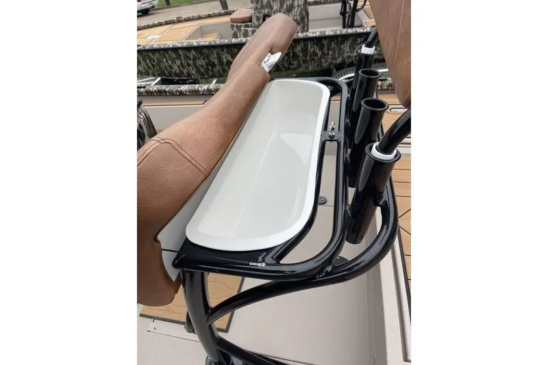 Slide: The Image of Avid 21 Fusion 2026 boat seat with integrated storage and rod holders. - 10