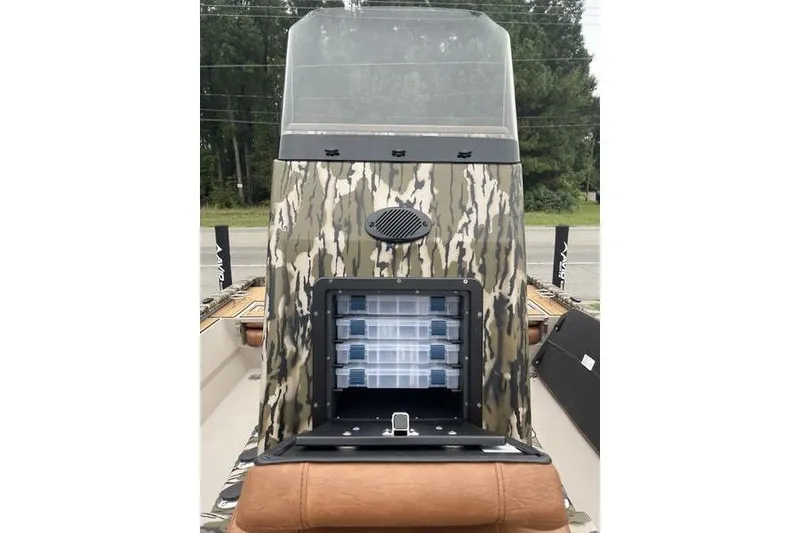 Slide: The Image of 2026 Avid 21 Fusion boat with camouflage design and storage compartments. - 2