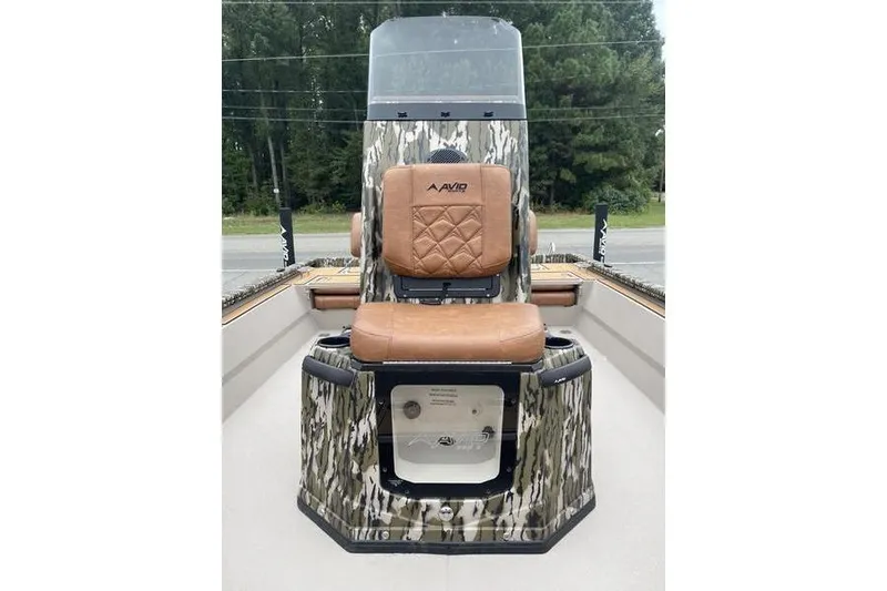 Slide: The Image of Avid 21 Fusion 2026 boat with camo design and brown seating. - 9