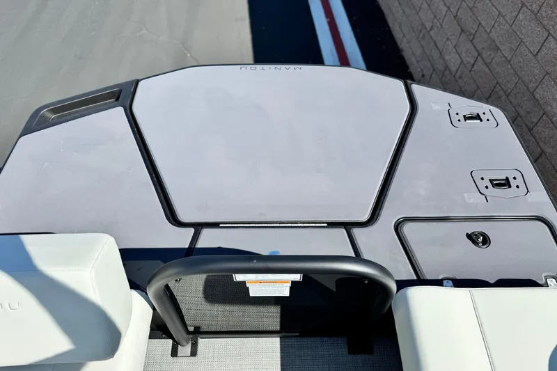 Slide: The Image of 2026 Manitou Cruise 22 Max boat deck with sleek design and modern features. - 17