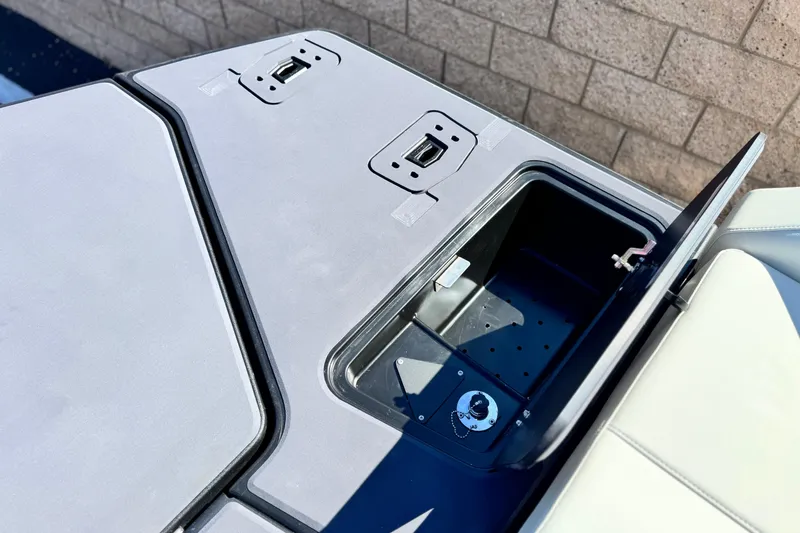 Slide: The Image of Storage compartment on 2026 Manitou Cruise 22 Max boat, featuring sleek design and durable materials. - 18
