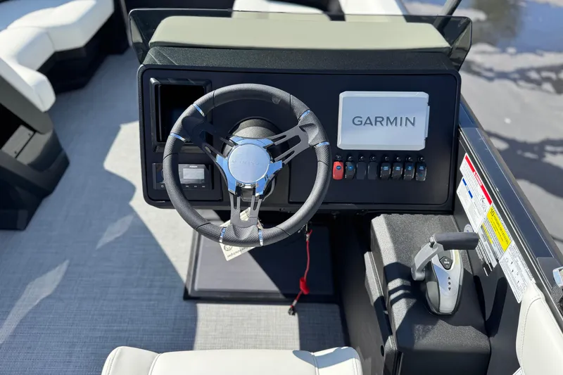 Slide: The Image of Steering console of 2026 Manitou Cruise 22 Max with Garmin navigation system. - 24