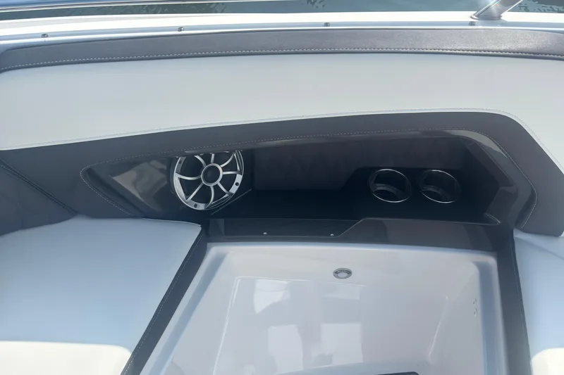 Slide: The Image of 2018 Monterey 328SS Super Sport boat seat with sleek white and black design. - 10