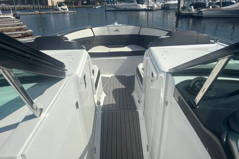 Slide: The Image of 2018 Monterey 328SS Super Sport boat interior with sleek seating and modern design. - 4