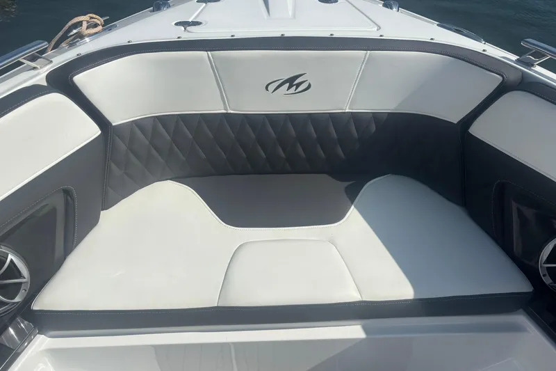 Slide: The Image of 2018 Monterey 328SS Super Sport boat seat with elegant white and black upholstery. - 8