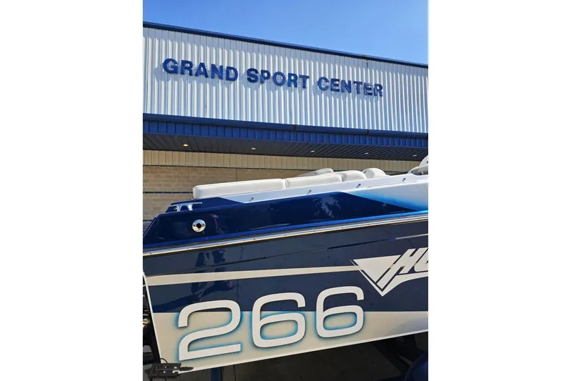 Slide: The Image of 2010 Hustler 266 Classic boat at Grand Sport Center. - 31