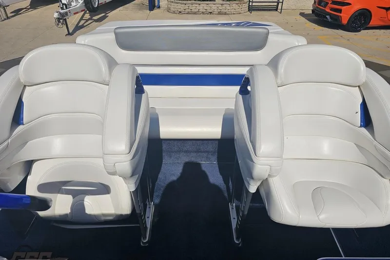 Slide: The Image of Interior of 2010 Hustler 266 Classic boat with white and blue seating. - 78