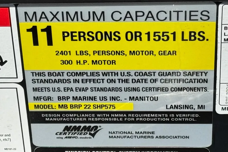 Slide: The Image of Maximum capacity label for 2026 Manitou EXPLORE 22 boat, 11 persons or 1551 lbs. - 27