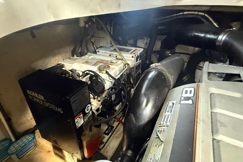 Slide: The Image of Engine compartment of a 2008 Sea Ray 350 Sundancer with Kohler power systems. - 11
