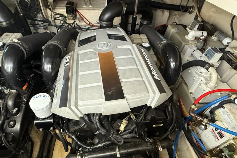 Slide: The Image of Engine compartment of a 2008 Sea Ray 350 Sundancer boat, featuring a Horizon 8.1 engine. - 13