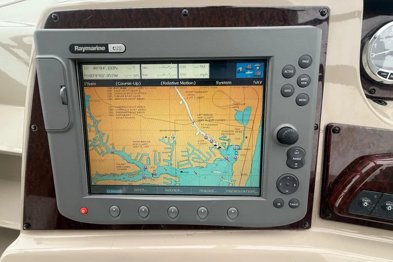 Slide: The Image of Raymarine C120 navigation system on 2008 Sea Ray 350 Sundancer boat dashboard. - 21