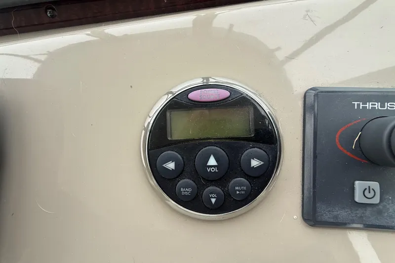 Slide: The Image of Control panel on a 2008 Sea Ray 350 Sundancer boat dashboard. - 23