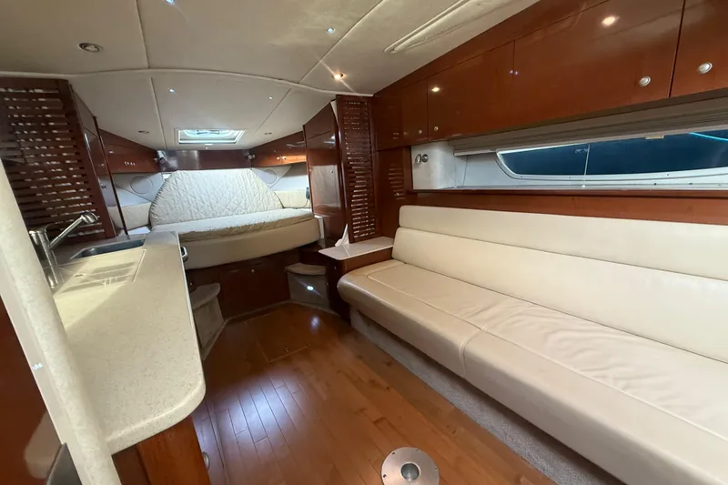 Slide: The Image of Luxurious interior of 2008 Sea Ray 350 Sundancer yacht with elegant wood and leather finishes. - 4