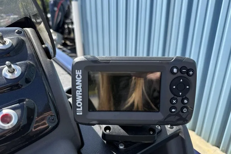 Slide: The Image of Lowrance fish finder on 2020 Tracker Pro 170 boat dashboard. - 13
