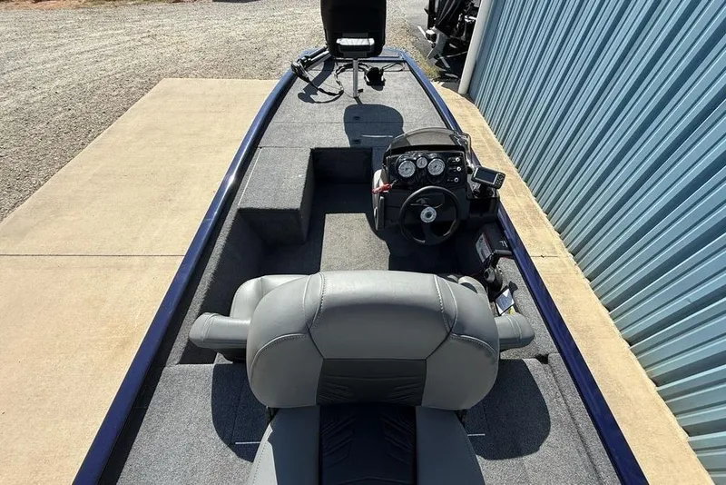 Slide: The Image of 2020 Tracker Pro 170 boat interior with steering console and seating. - 20