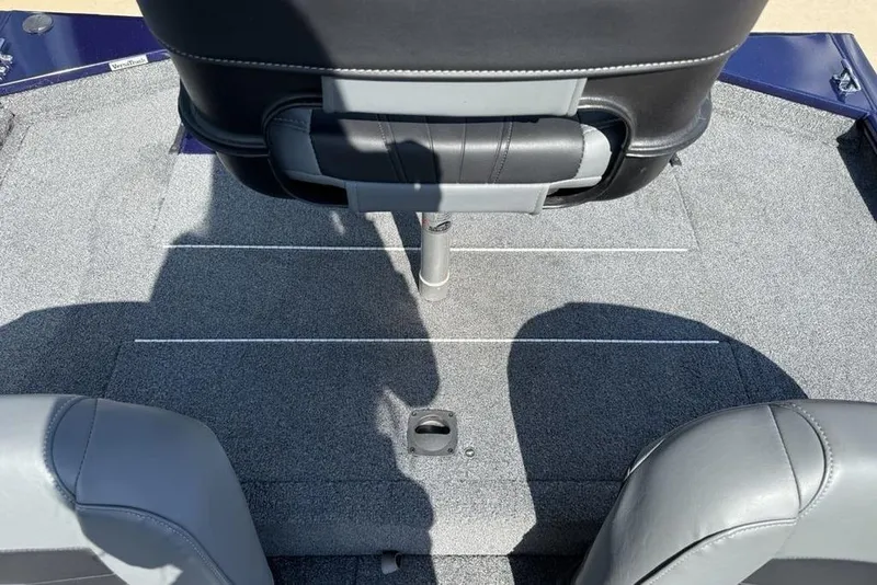 Slide: The Image of 2020 Tracker Pro 170 boat interior with gray seating and carpeted floor. - 21