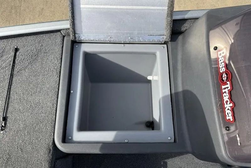 Slide: The Image of 2020 Tracker Bass Tracker Classic XL boat storage compartment with open lid. - 11