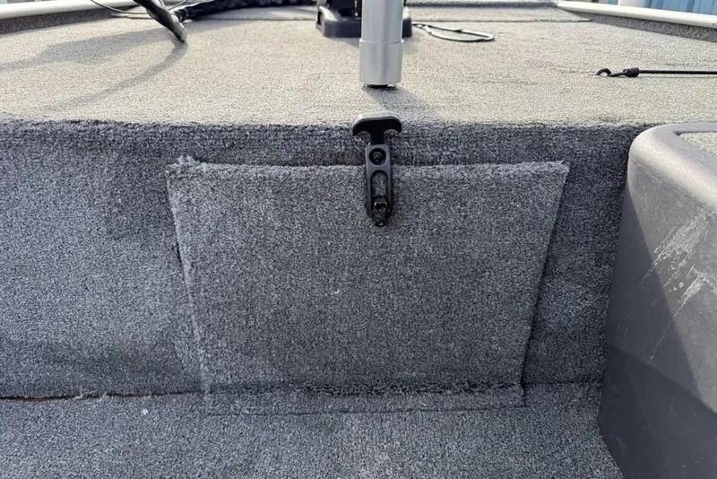 Slide: The Image of 2020 Tracker Bass Tracker Classic XL boat interior with carpeted storage compartment. - 12