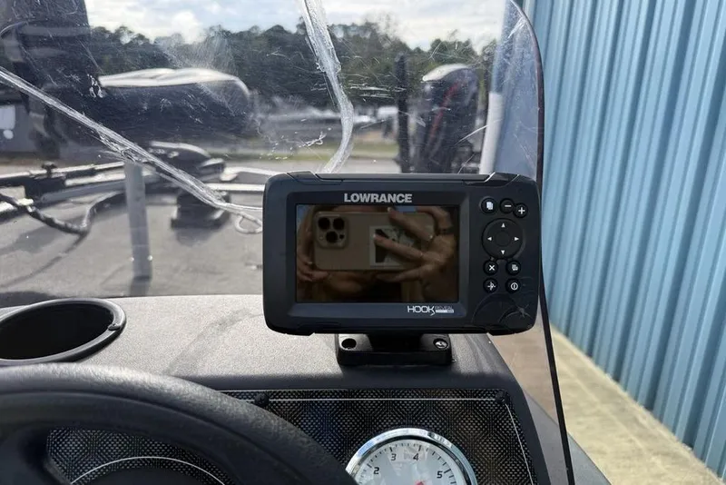 Slide: The Image of Lowrance fish finder on 2020 Tracker Bass Tracker Classic XL boat dashboard. - 17