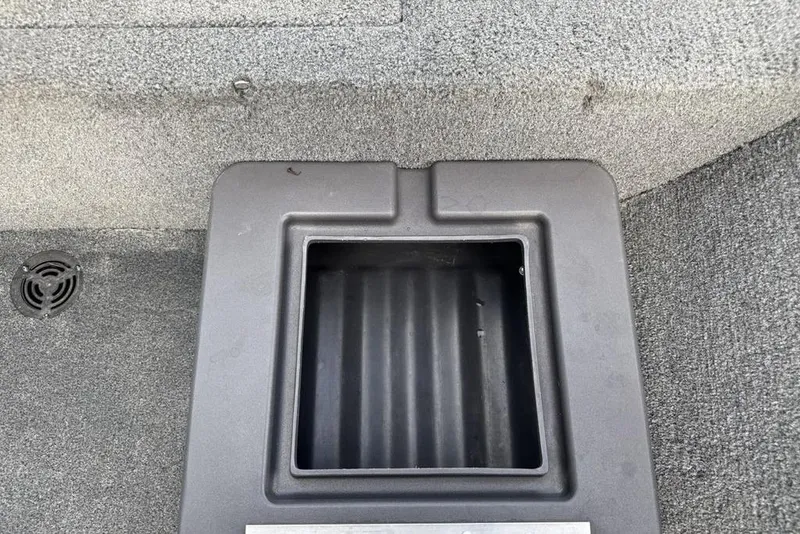 Slide: The Image of Storage compartment in 2020 Tracker Bass Tracker Classic XL boat interior. - 18