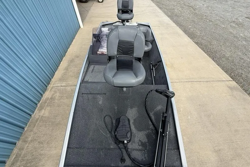 Slide: The Image of 2020 Tracker Bass Tracker Classic XL boat with gray seating and trolling motor. - 24