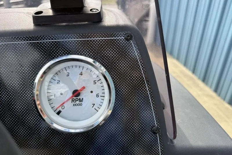 Slide: The Image of Tachometer on 2020 Tracker Bass Tracker Classic XL boat dashboard, showing RPM x1000. - 5