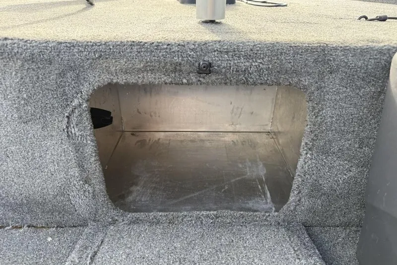 Slide: The Image of Open storage compartment in 2020 Tracker Bass Tracker Classic XL boat. - 9