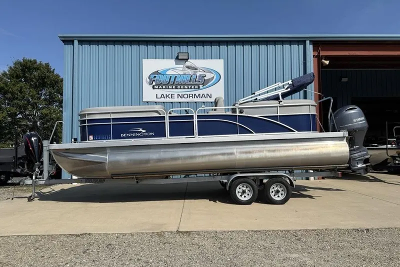 The Image of 2023 Bennington 22 pontoon boat on trailer at Foothills Marine Center, Lake Norman. - 0