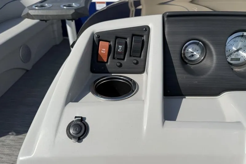 Slide: The Image of Control panel of 2023 Bennington 22 boat with switches and gauges. - 15