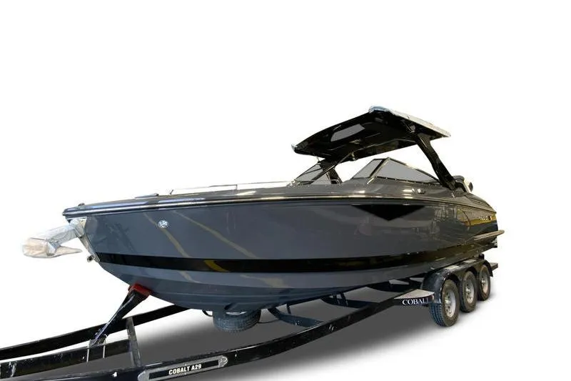 Slide: The Image of 2026 Cobalt A29 boat dashboard with modern steering wheel and control panel. - 7