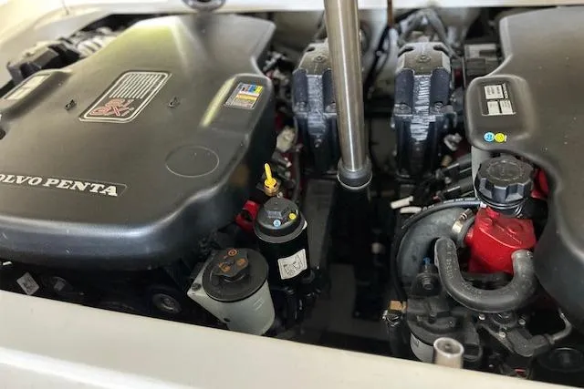 Slide: The Image of Engine compartment of a 2011 Cobalt 302 with Volvo Penta components. - 17