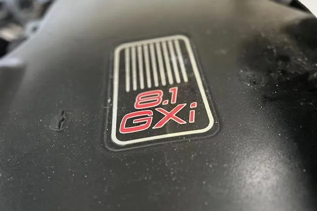 Slide: The Image of Close-up of 2011 Cobalt 302 engine cover with 8.1 GXi branding. - 18