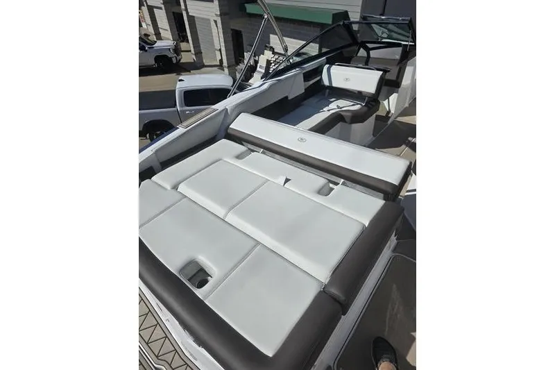 Slide: The Image of 2022 Cobalt R4 boat interior with sleek, modern seating design. - 13