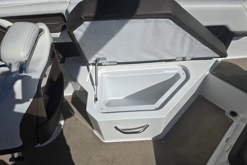 Slide: The Image of Open storage compartment in 2022 Cobalt R4 boat interior. - 15