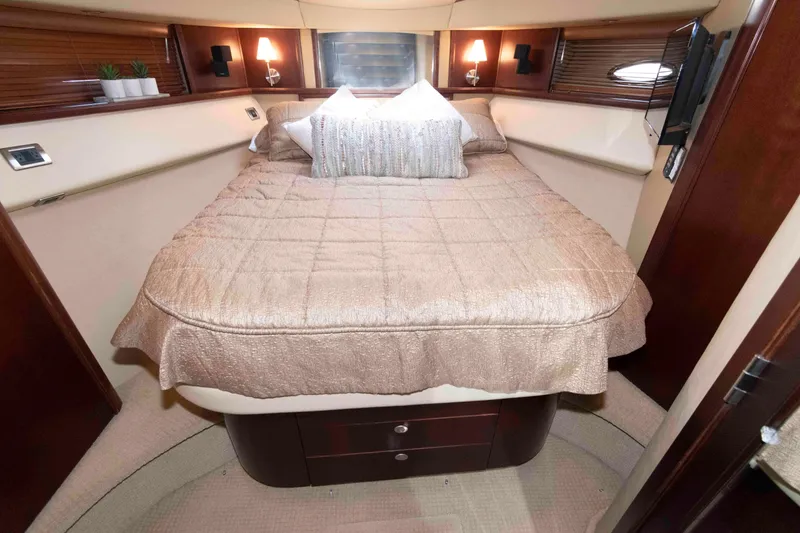 Slide: The Image of Luxurious bedroom interior of 2006 Sea Ray 52 Sedan Bridge yacht. - 28