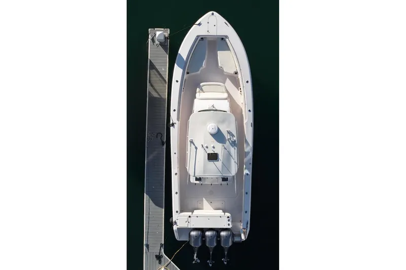 Slide: The Image of Aerial view of 2014 Grady-White Canyon 376 boat docked at a pier. - 4
