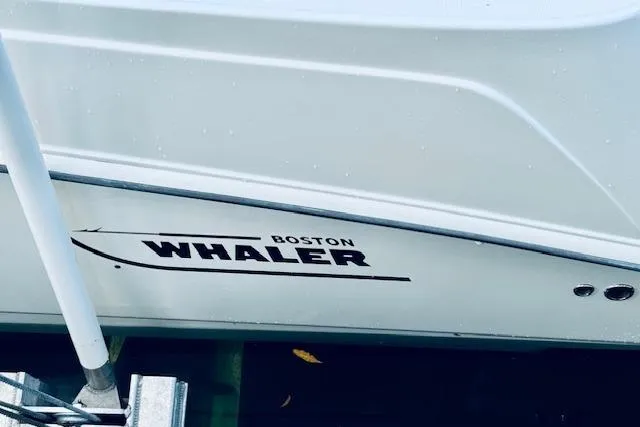 Slide: The Image of 2016 Boston Whaler 320 Outrage boat hull with logo visible. - 14