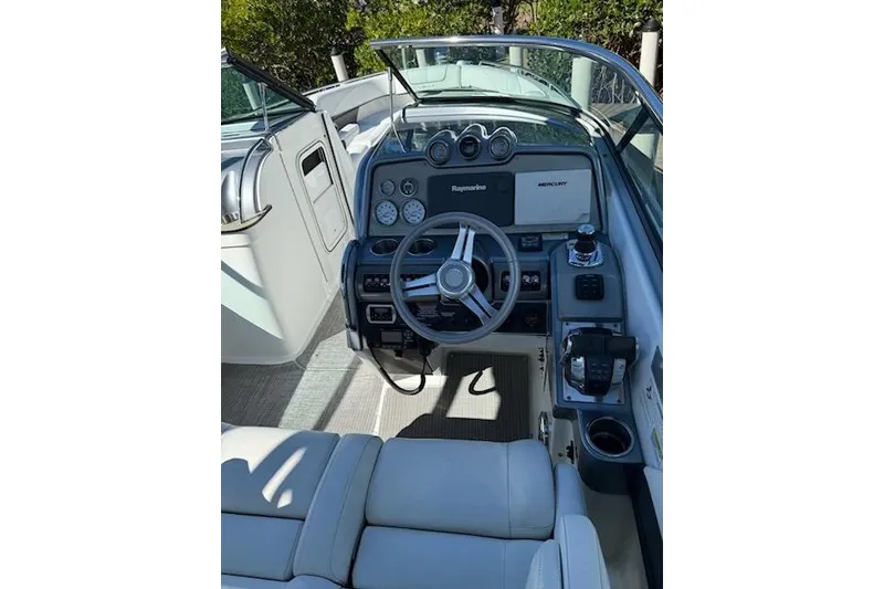 Slide: The Image of 2015 Formula 310 Bowrider cockpit with steering wheel and control panel. - 7