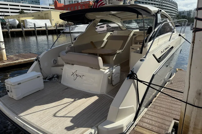 Slide: The Image of 2014 Azimut Atlantis 34 yacht docked at marina, rear view. - 2