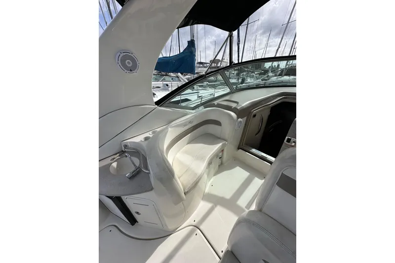 Slide: The Image of Interior view of 2003 Sea Ray 320 Sundancer boat, featuring seating and sleek design. - 15