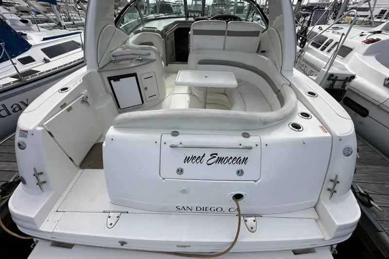 Slide: The Image of 2003 Sea Ray 320 Sundancer boat docked in San Diego marina. - 9