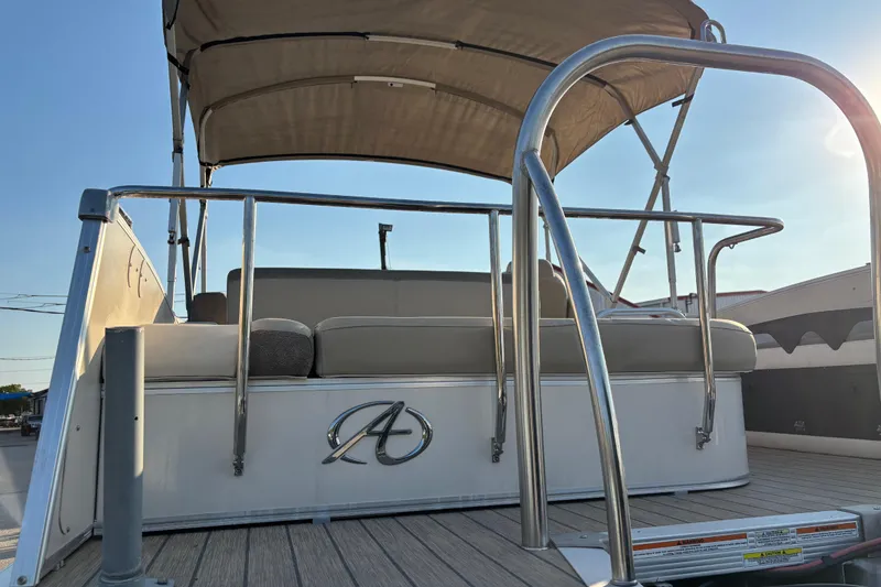 Slide: The Image of Outboard motor with "200" label on Avalon Catalina 2585 VRB, 2022 model, under clear sky. - 25