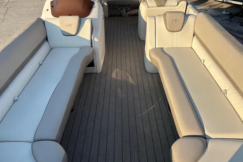 Slide: The Image of 2022 Avalon Catalina 2585 VRB interior with beige seating and wood-style flooring. - 33