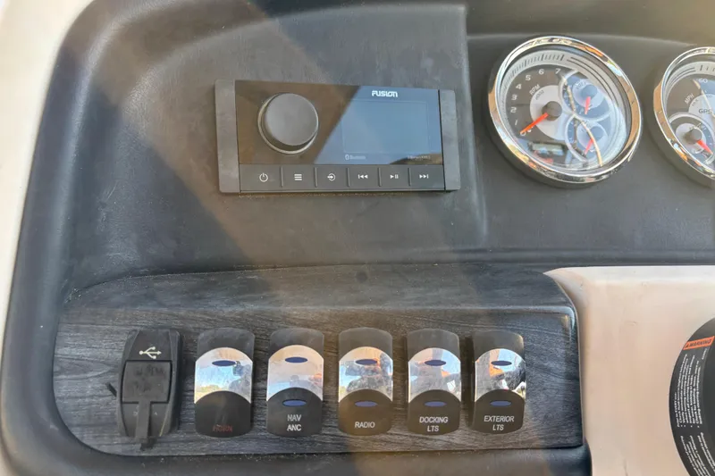 Slide: The Image of Control panel of 2022 Avalon Catalina 2585 VRB with gauges and switches. - 49